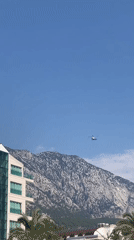 Helicopters, blooms, and mountain air in Kemer