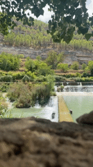 Tiered waterfalls and green river pools near Jorquera, Spain