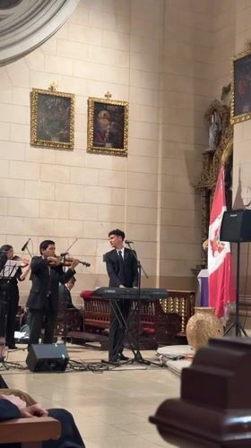 Live music and ornate interiors at San Isidro Church, Lima