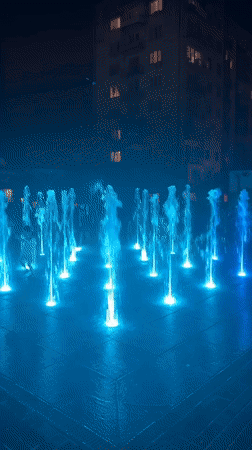 Blue-lit fountain lights up a Sokhumi night
