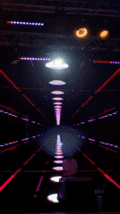 DJ performs live in Bodrum venue with shifting neon LED visuals