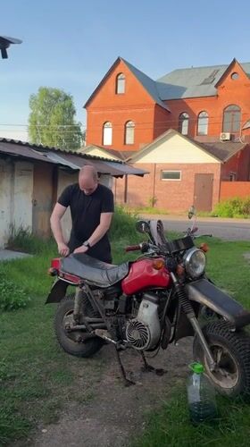 Quiet afternoon moments captured in Reshetnikovo: motorcycles, selfies, playground