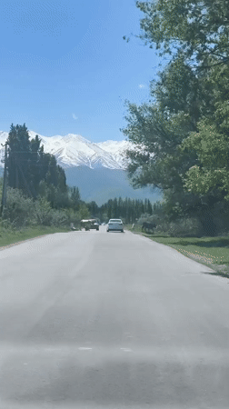 Morning traffic on mountain road near Kalygul, Kyrgyzstan