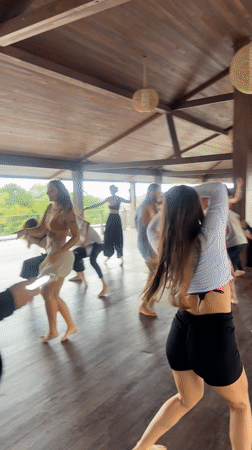 Early morning dance class held at wooden pavilion in Mengwi