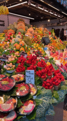 Busy afternoon crowds documented at Barcelona's La Boqueria market