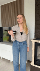 Woman in plaid documented in casual moments around Dreiliņi