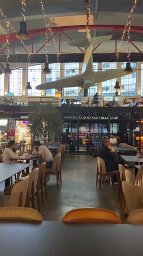Acoustic band performs at Belgrade's aviation-themed Hangar Food Market