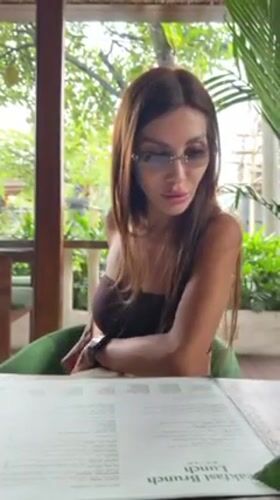 Woman dines at Indonesian cafes during early morning hours