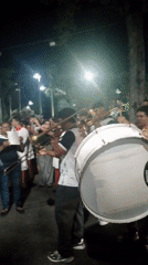 Nighttime religious procession with marching band in Tinaquillo, Venezuela
