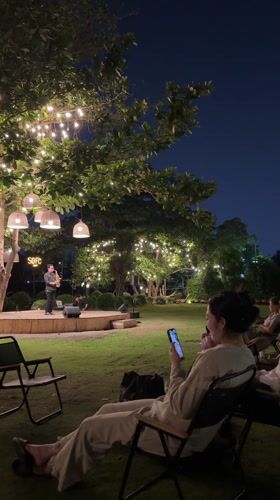 Saxophone performance draws casual audience at Ho Chi Minh outdoor venue