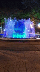 Colorful fountain display and flowering plants documented in Nha Trang