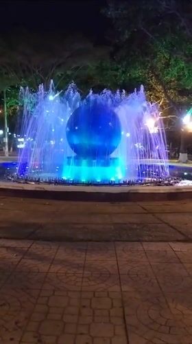 Colorful fountain display and flowering plants documented in Nha Trang