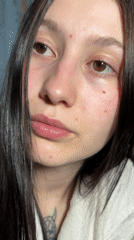 Woman takes selfies in bedroom in Фоки, Russia