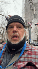 Iranian demonstrators gather in NYC park with flags, banners