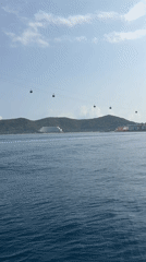Cable cars operate over ocean waters near Nha Trang