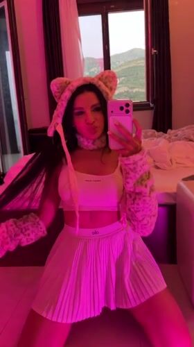 Woman documents coastal getaway with selfies in Boreti, Montenegro