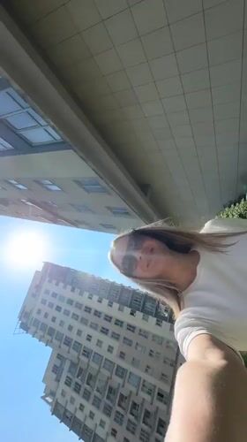 Woman, girl walk together while filming selfie in Esenyurt