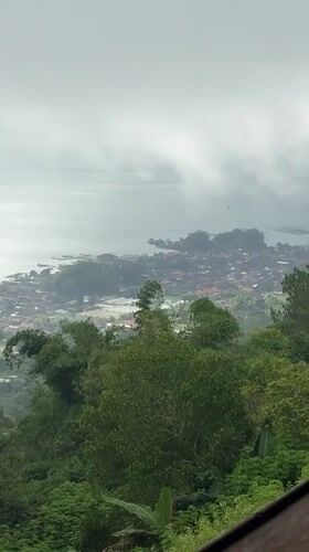 Overcast day captured over lakeside town in Kintamani, Indonesia