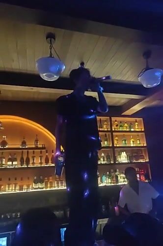 Bar night in Nanhai: counter antics, colored lights, crowd energy