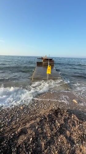 Budva at dawn: street cleaners, scooters, and seaside calm