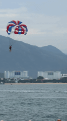 Early morning parasailing activity observed above Nha Trang waters
