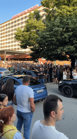 Crowd gathers with balloons near Grand Hotel Plovdiv