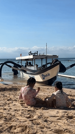 Morning beach activities captured at Kuta Selatan, Indonesia