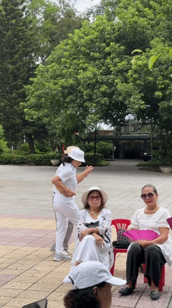 Outdoor gathering at a public plaza in Thuận Hóa Ward