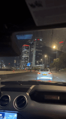 Nighttime highway drive through Tel Aviv captured on video