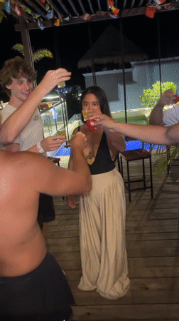 Young adults celebrate with shots at Playa del Carmen bar