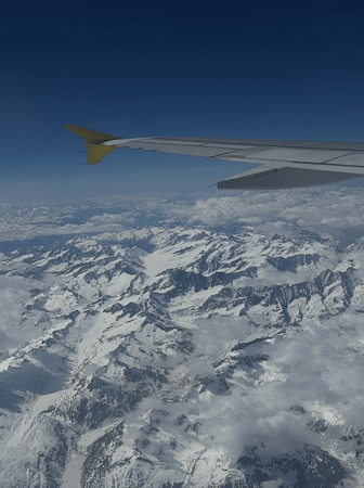 Aerial view captured of Swiss Alps from passenger aircraft