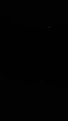 The video begins with a black screen. A voice can be heard. Light appears in the middle of the screen.