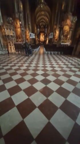 Cathedral interior with checkered floor documented in Vienna