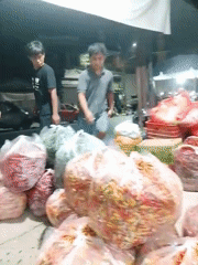 Nighttime chili pepper market in Tungkaran Pangeran, Indonesia