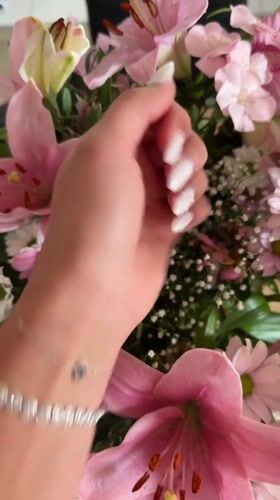 Woman's manicured hands and feet documented in Cannes