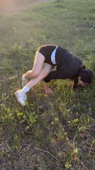 Woman observed in unusual crouched position in Russian field