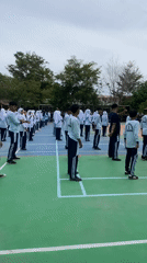 School day mix of PE drills and courtyard paving work