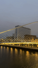 Zubizuri Bridge at dusk, Bilbao waterfront