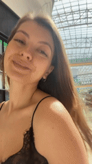Woman takes morning selfies at Khimki shopping center