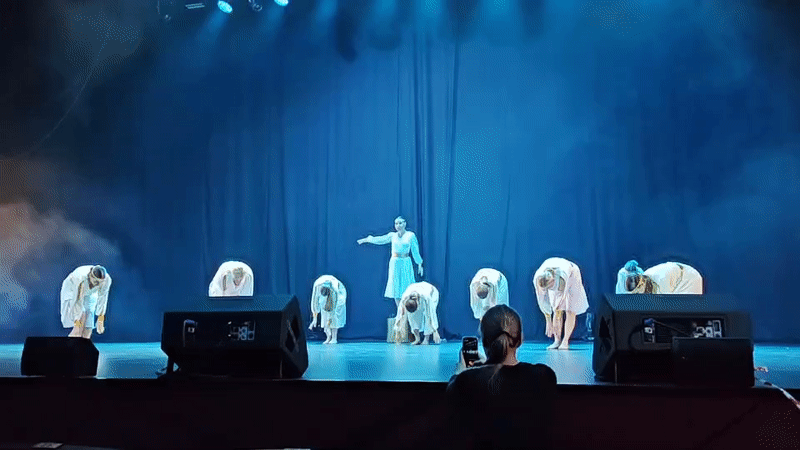 Synchronized dance performances on a Moscow stage