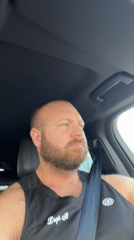 Driver in branded tank top observed in car in Chaikovsky