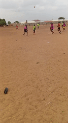 Soccer match played on dirt field in Nigeria