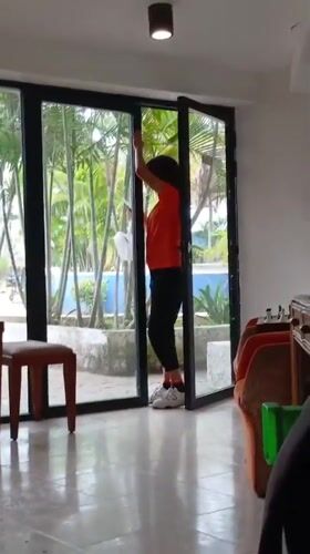 Hotel animation team rehearses dance routines during rainy evening