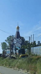 White church with golden dome documented in Sochi