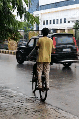 Rainy day scenes across a waterlogged Gurgaon