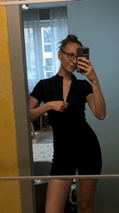Woman takes bathroom selfie in Khimki, Russia