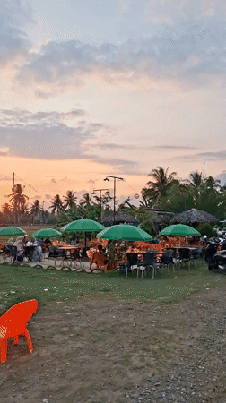 Ordinary life documented across Indonesian towns during morning hours