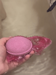 Pink bath bomb used in Noviy, Russia bathtub
