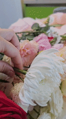 Flower shop in Asan-si shoots bouquet content on a summer morning