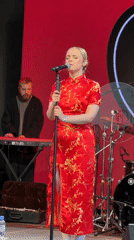 Female singer performs in traditional Chinese dress, Saint Petersburg